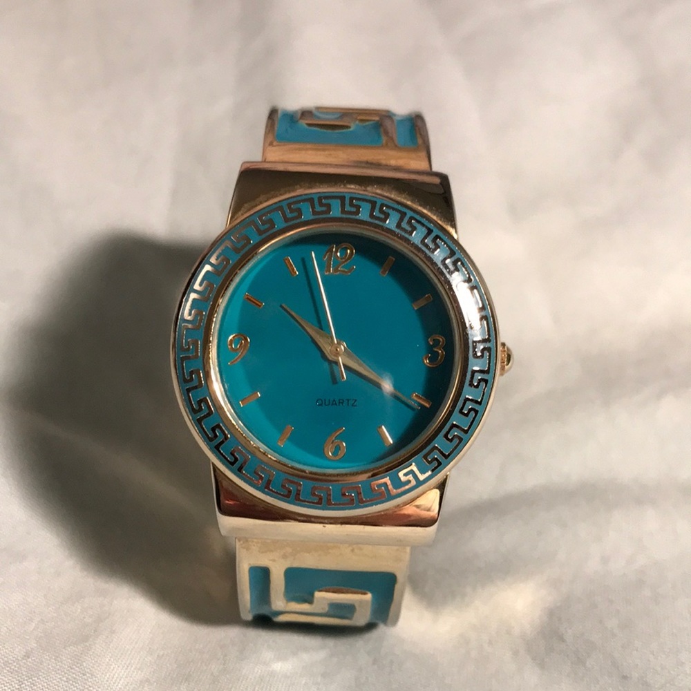 Gold and blue bangle watch